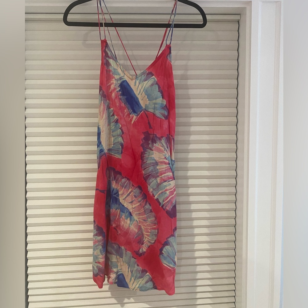Anthropology slip mini dress with floral beachy pattern.